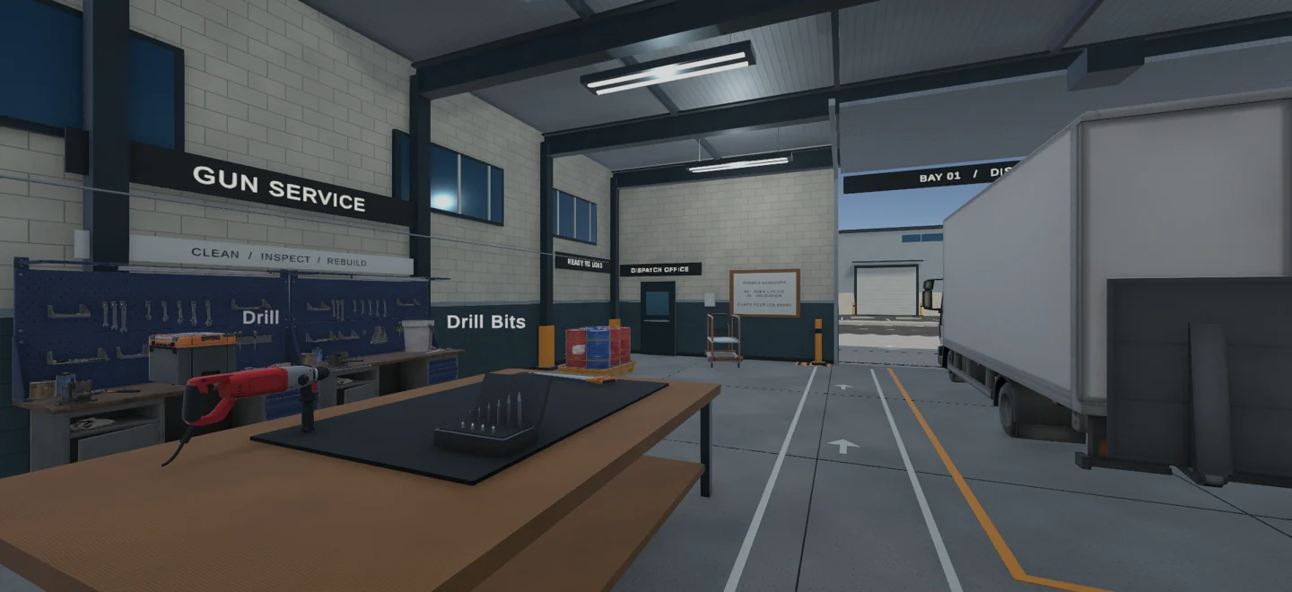 The virtual training shop, with equipment ready to load beside a work truck